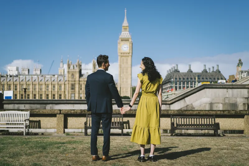 Parmida and Jake walking hand in hand through London